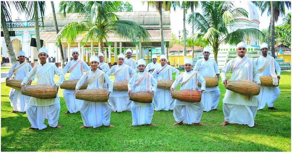 Khol Vadya performers gathered outdoors