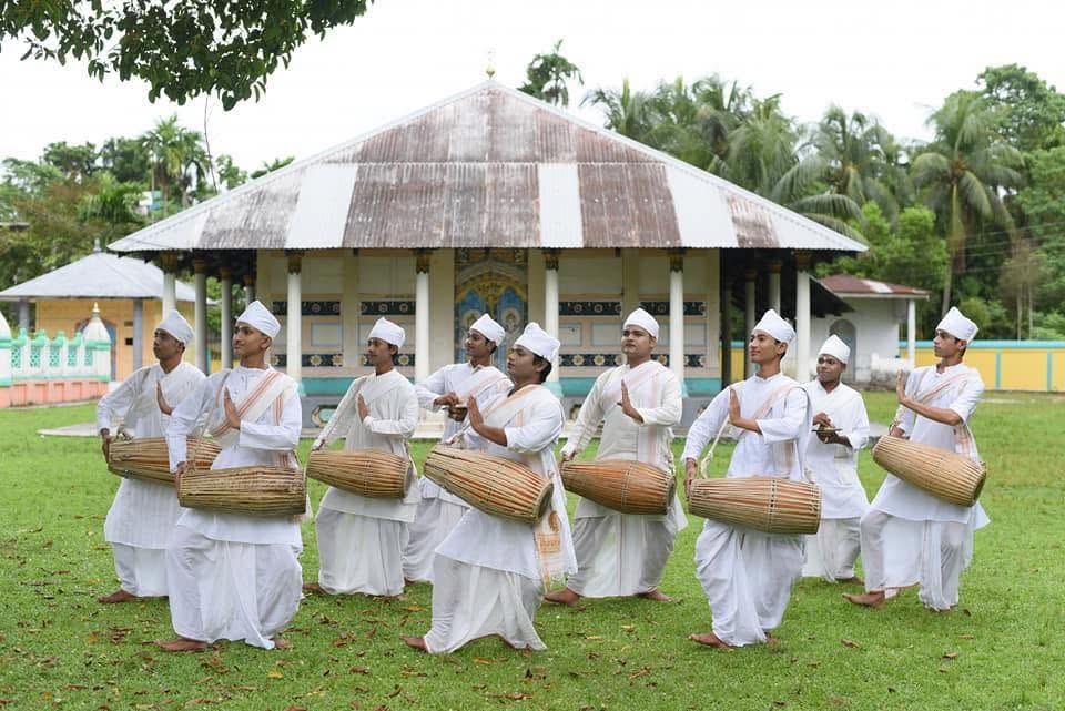 Khol Vadya performers gathered outdoors